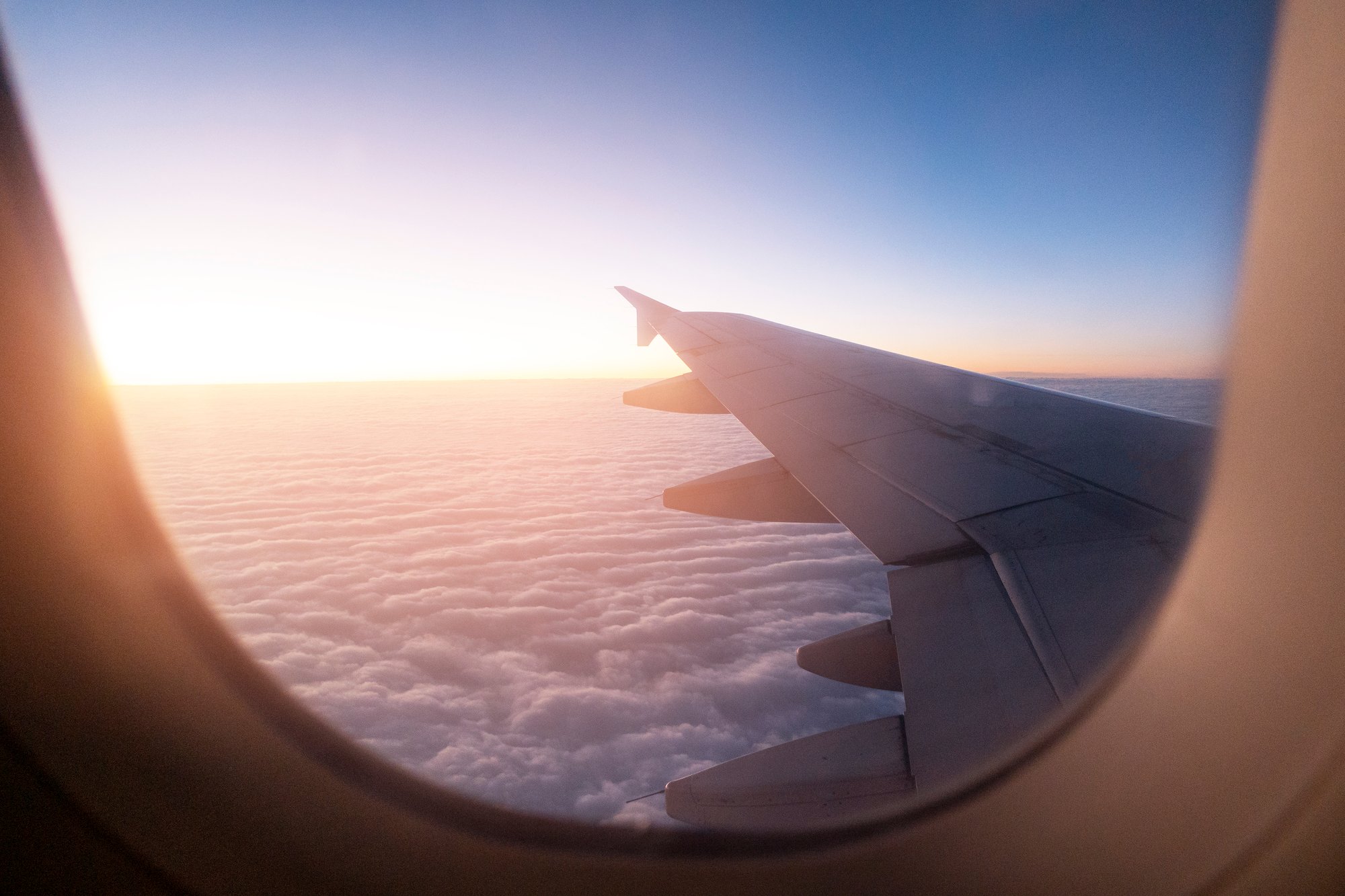 morning-light-from-window-airplane-wing